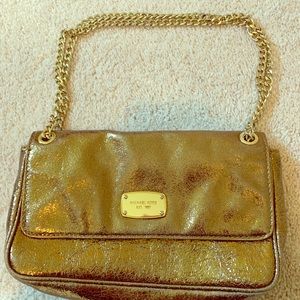 Metallic/gold Michael Kors bag.
